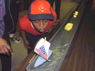 Myles w raingutterboat.jpg (173292 bytes)